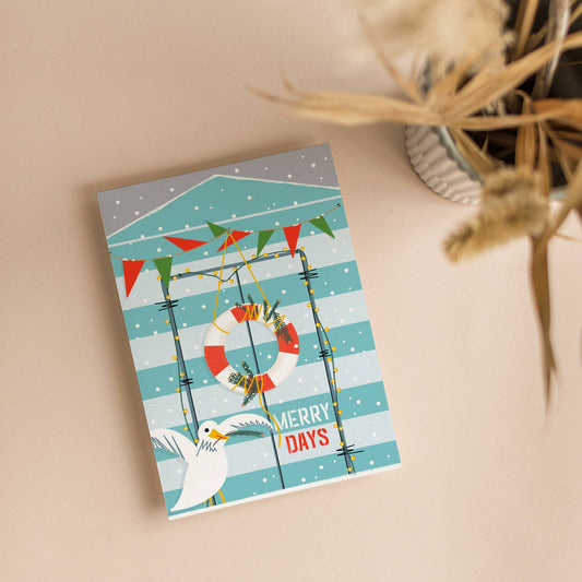 Coastal Christmas card Christmas at the beach hut light blue